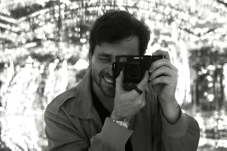 Will Greenberg holding a camera